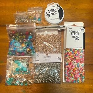 Lot of assorted beads and clear stretch cord